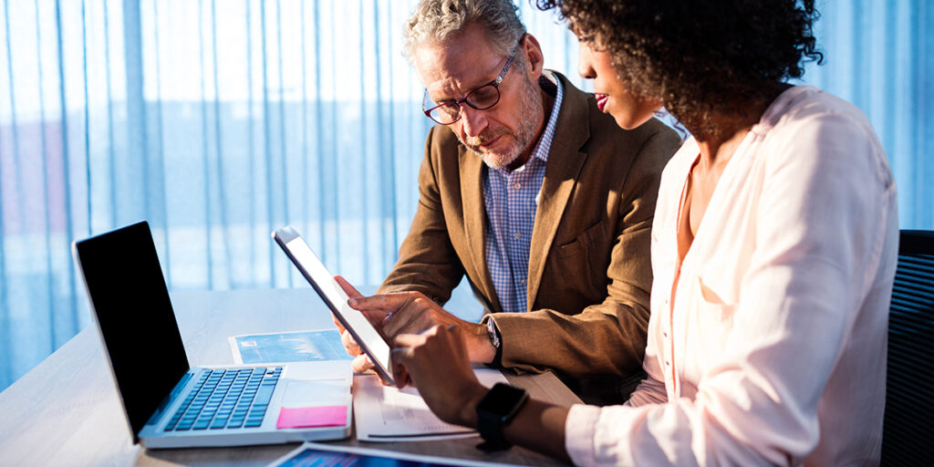 two-people-working-in-an-office-2025-10-28-21-49-18-utc | Copy Systems Inc. two people working in an office