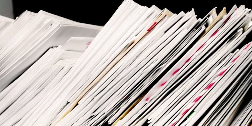 stack of mail and other documents