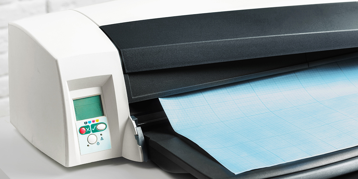Laminator with paper ready for printing in a modern office space d